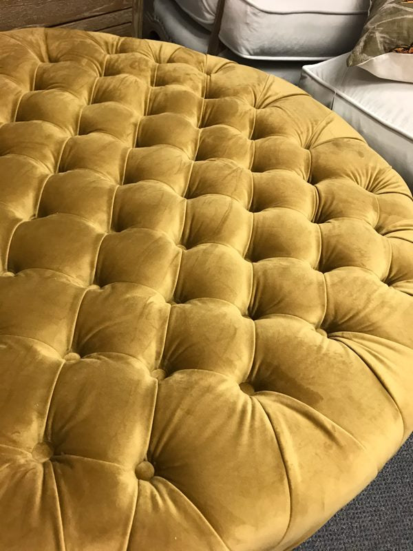 Round Tufted Ottoman Mustard/ Castors